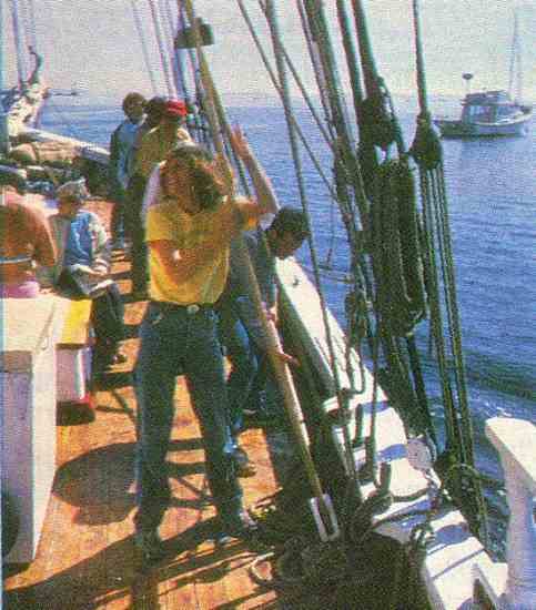 
Travelers help out by hauling halyards to raise sail.

